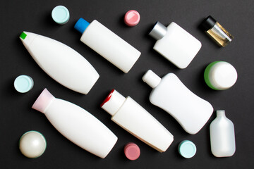 Group of plastic bodycare bottle Flat lay composition with cosmetic products on colored background empty space for you design. Set of White Cosmetic containers, top view with copy space