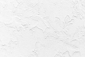 Rough patterned white cement wall texture and seamless background
