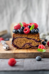 Cake with blueberries and raspberries 