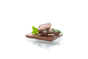 sweet dark chocolate with nuts on a white background