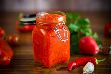 fresh natural homemade sauce made of peppers, tomatoes and other vegetables