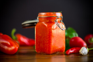 fresh natural homemade sauce made of peppers, tomatoes and other vegetables