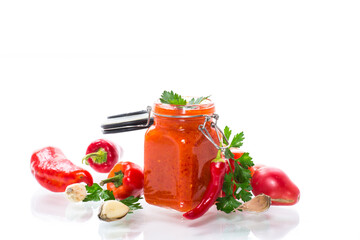 fresh natural homemade sauce made of peppers, tomatoes and other vegetables