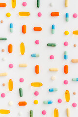 Pills and medicines pattern top view, medical pills and tablets background