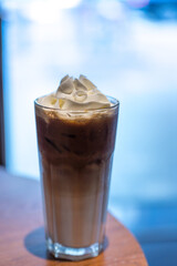 Iced coffee with whipped cream and sprinkle with almonds
