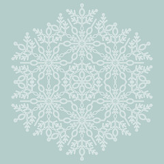 Round vector snowflake. Abstract winter ornament. Light blue and white snowflake