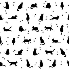 Seamless pattern with black cats