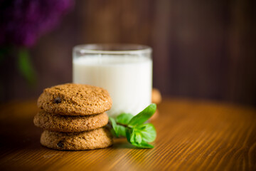oatmeal cookies with a glass of fresh milk for breakfast