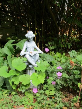 statue amongst the flowers