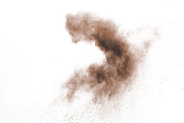 Brown powder explosion isolated on white background.