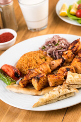 Traditional Turkish grilled Chicken shish kebab with vegetables grilled on skewers