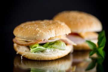 morning sandwich with bacon, cheese and herbs