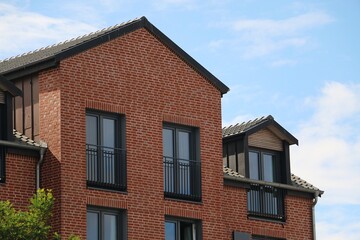 close up of a new beautiful apartment building in the sunshine