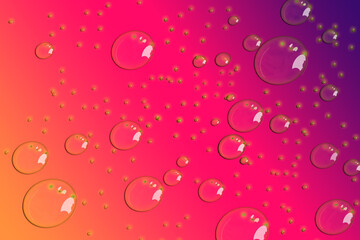 Multiple Drops of water on a colored  background.  in Red. Selective focus. Gradient