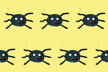 Halloween seamless pattern with funny cartoon spider. Endless texture for wallpaper, web page background, wrapping paper. Flat style. Black smiling spider with tongue on yellow board