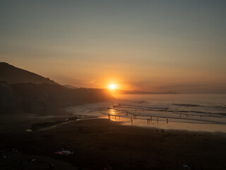 Fototapeta na wymiar sunset on the coast of zumaia.