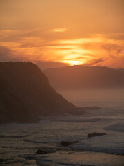 sunset on the coast of zumaia.