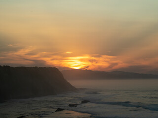 sunset on the coast of zumaia.