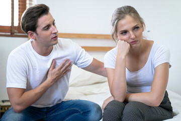 Young couple quarrels among themselves at home, Relationship problems.