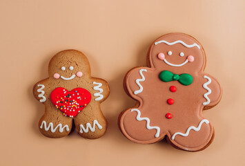 Christmas gingerbread man over beige background. Minimal concept.