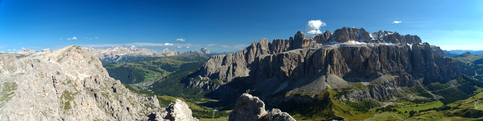 Gardena Pass in Italy Dolomites Alps nice weather extra wide panorama