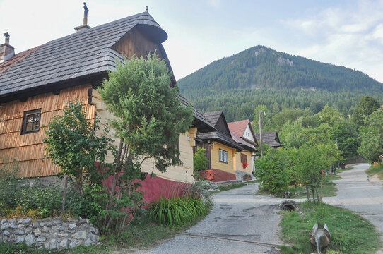 VLKOLINEC, SLOVAKIA, EUROPE, SUMMER 2015. Beautiful street in the center of the Unesco Heritage village of Vlkolinec. The houses are made of wood and painted in neutral colors.