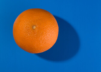 orange on blue background