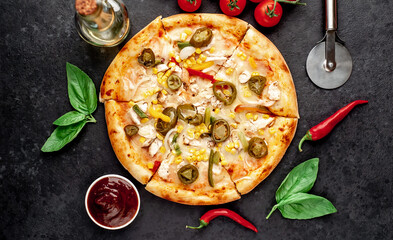 Mexican pizza with ingredients on stone background