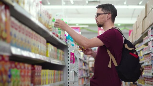 Man wants to buy baby cereals in the supermarket