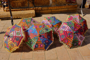 Colorful  hand made umbrellas kept at a market in jaisalmer Rajasthan India on 21 February 2018