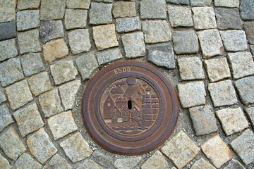 plaque d égout