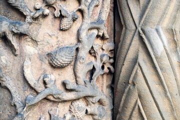 closeup detail of geometrical and floral patterns carved in stone at the entrence to the gothic cathedral in Wroclaw, Poland
