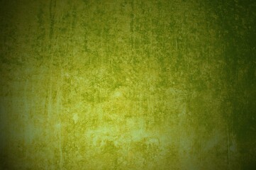 Dreckige Betonwand mit gelber Farbe als grunge Hintergrund