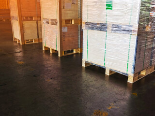 Shipment cartons box on pallets and wooden case on forklift in interior warehouse cargo for export and sorting goods in freight logistics and transportation industrial, delivery 