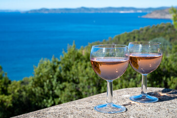 Picnic with of local rose wine and blue Mediterranean sea on background, near Saint-Tropez, Var, Provence, France
