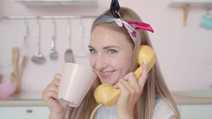 Close-up of excited young Caucasian woman talking on rotary phone. Retro lady in old-fashioned clothes enjoying weekends in 1960s. Old-style vintage. - Powered by Adobe