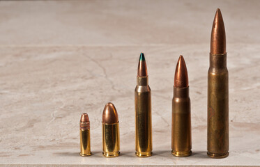 front view, close distance of a variety of ammunition, 22L, 9 mm, 5.6 mm, 7.62 mm, 8 mm Mauser