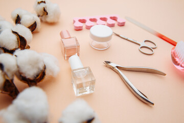 Obraz na płótnie Canvas Beauty care. Tools for creating and for the treatment of nails on pink background.