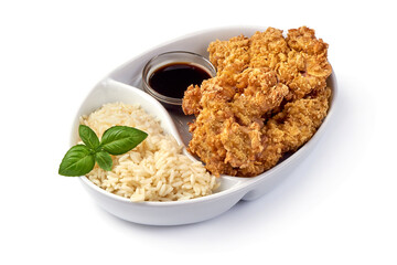 Fried chicken strips in breadcrumbs with rice, isolated on white background