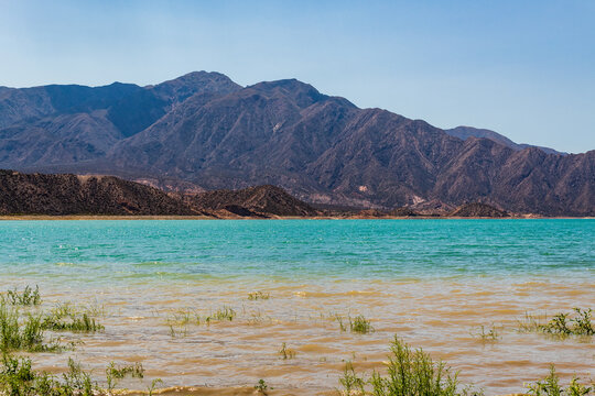 Wonderful Potrerillos Mountains in front of lake.
