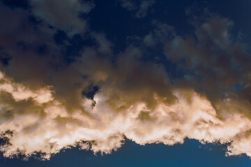 Black clouds in the blue sky