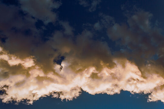 Black clouds in the blue sky