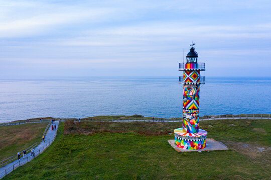 Cabo de Ajo Lighthouse painted by the painter Okuda San Miguel, specialized in Urban Art. Ajo, Bareyo Municipality, Cantabria, Cantabrian Sea, Spain, Europe