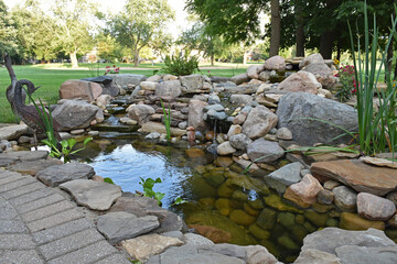 Finished backyard water feature constructed by the homeowner as a DIY project