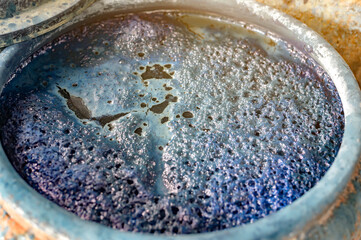 Indigo liquid in an indigo curing tank Ready for dyeing