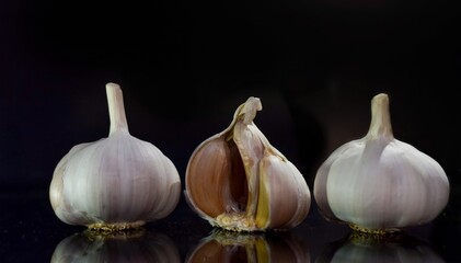 garlic on a black background