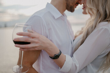 Man and woman hold hands close up