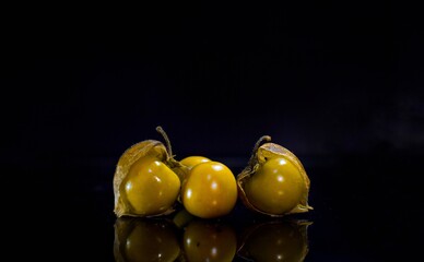 olives on a black background