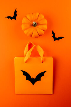 Orange Paper Bag, Black Bats And Pumpkin