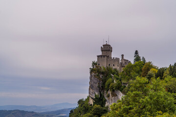 Obraz premium Cesta Tower in San Marino under cloudy skies